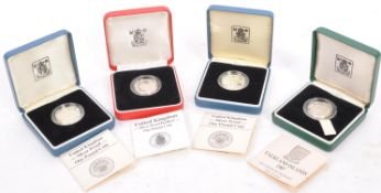 FOUR ROYAL MINT 925 SILVER ONE POUND COINS - BOXED - CERTIFICATE