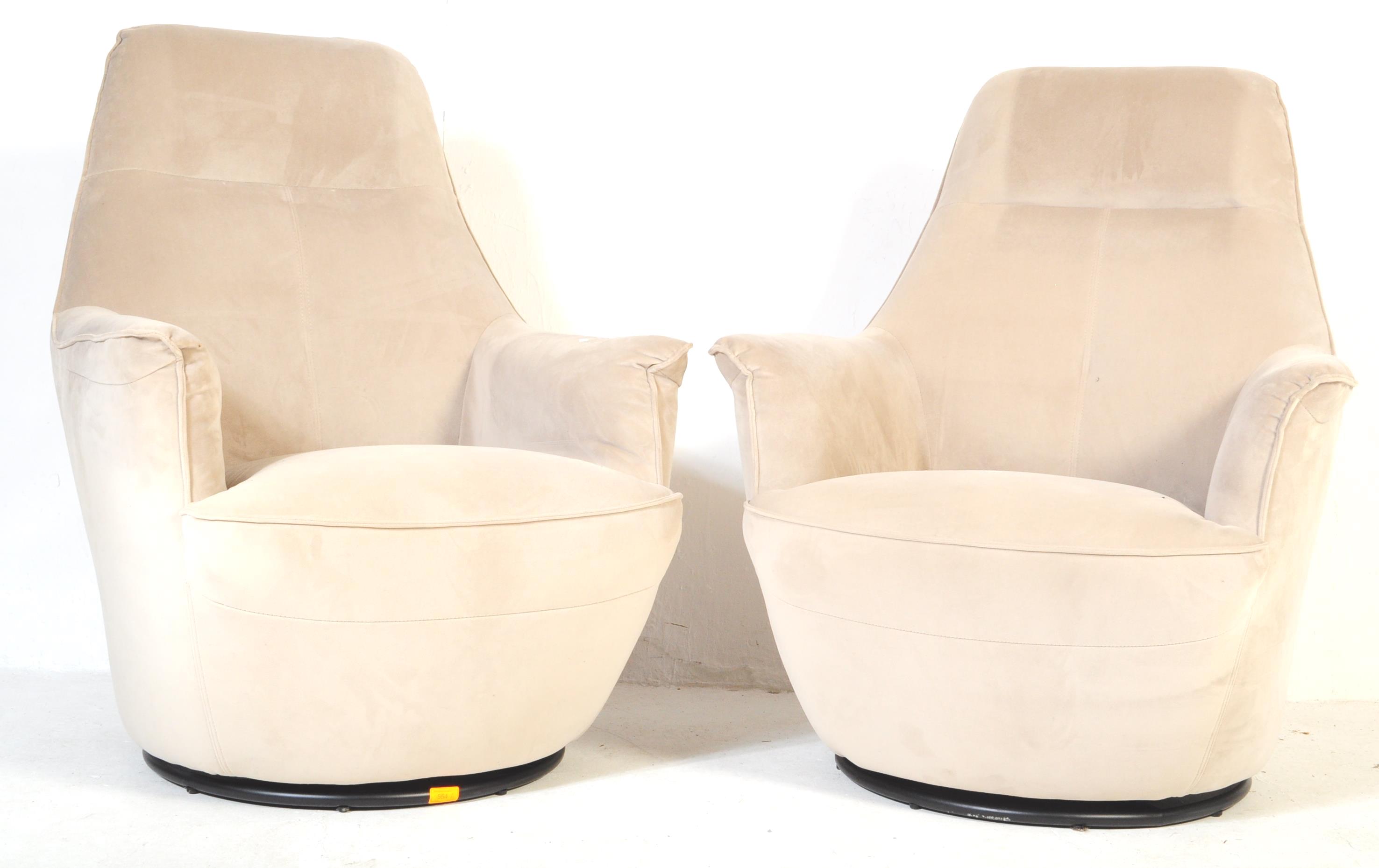 PAIR OF CONTEMPORARY VINTAGE STYLE SWIVEL ARMCHAIRS