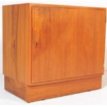 A LATE 20TH CENTURY TEAK SIDEBOARD ON A PLINTH BASE