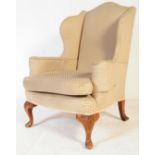 20TH CENTURY UPHOLSTERED WINGBACK ARMCHAIR