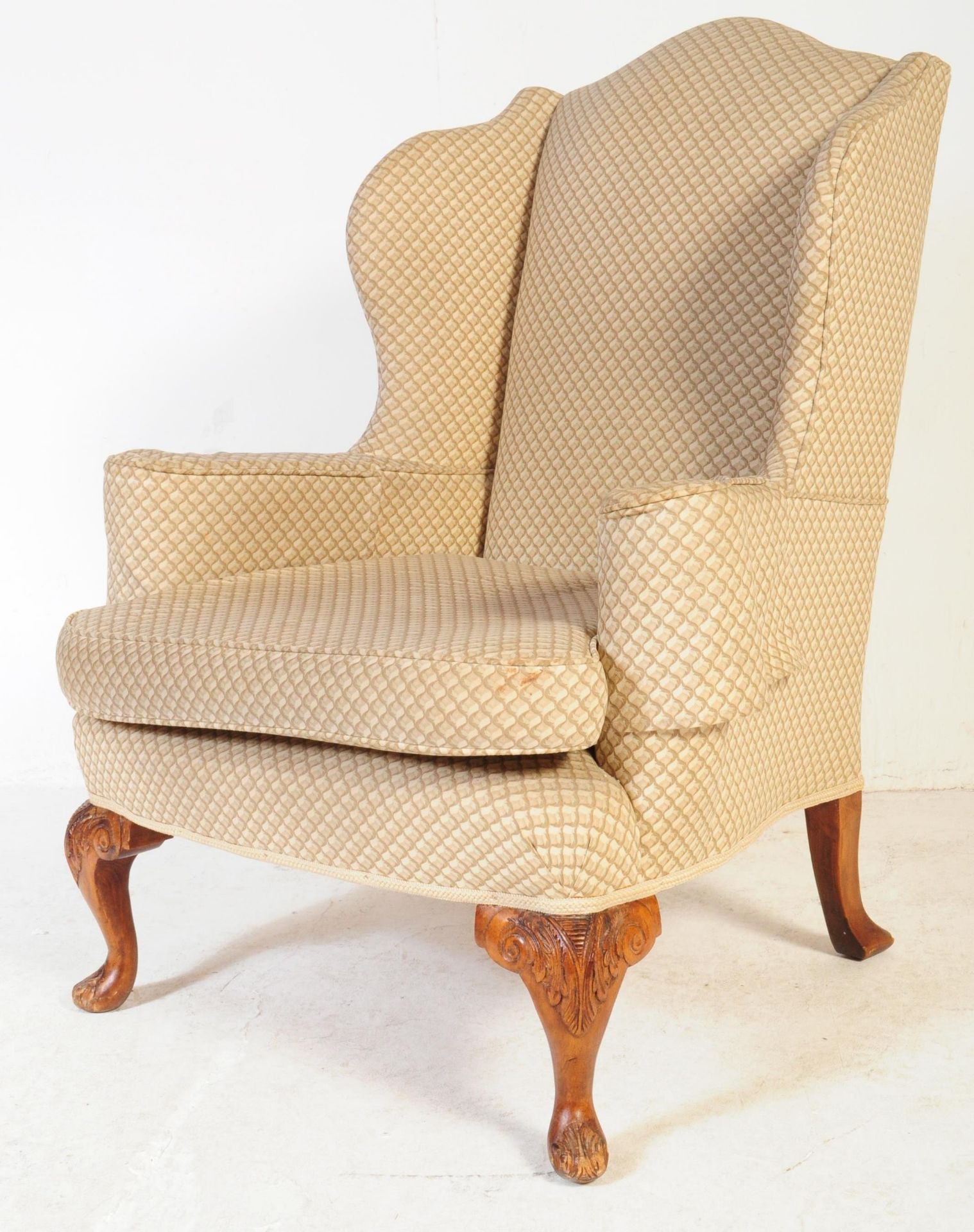 20TH CENTURY UPHOLSTERED WINGBACK ARMCHAIR