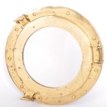 EARLY 20TH CENTURY BRASS SHIPS PORTHOLE MIRROR