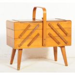 A VINTAGE RETRO MID CENTURY TEAK METAMORPHIC SEWING BOX