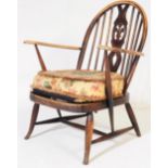 MID 20TH CENTURY ERCOL FLEUR DE LYS LOUNGE ARM CHAIR