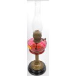 19TH CENTURY CRANBERRY GLASS AND BRASS OIL LAMP