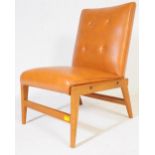 A RETRO VINTAGE MID 20TH CENTURY TAN VINYL CHAIR