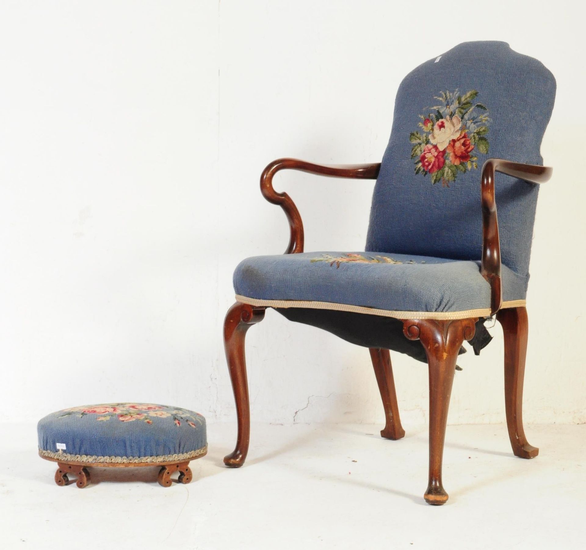 EARLY 20TH CENTURY MAHOGANY LOUNGE ARM CHAIR WITH STOOL
