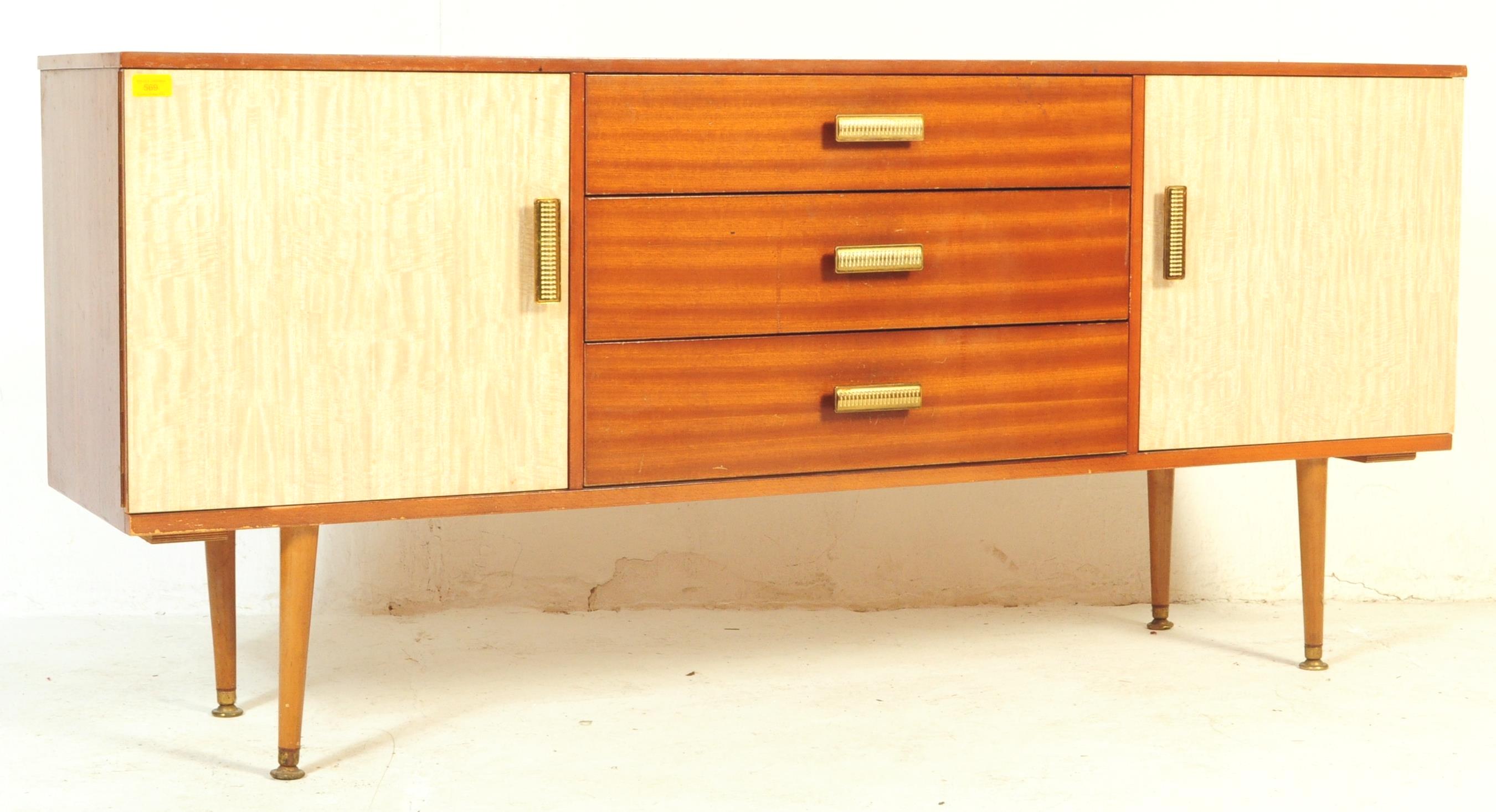A RETRO VINTAGE 1970 WOODEN SIDEBOARD WITH FORMICA COVERED DOORS