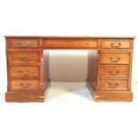 AN EARLY 20TH CENTURY MAHOGANY TWIN PEDESTAL PARTNERS DESK