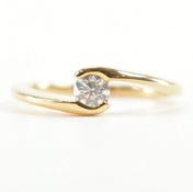GOLD & DIAMOND CROSSOVER SOLITAIRE RING