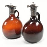 VICTORIAN HALLMARKED SILVER TOPPED AMBER GLASS DECANTERS