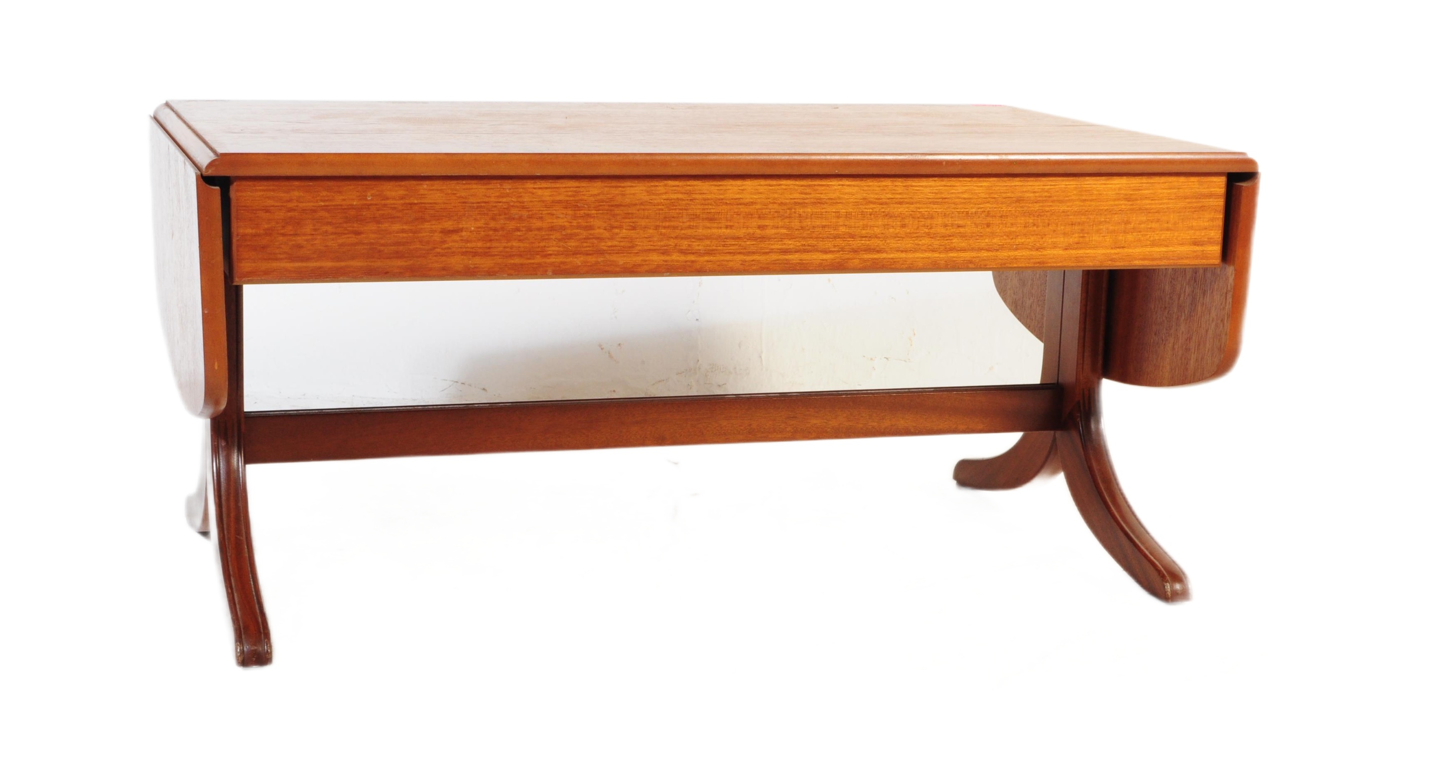 A MID 20TH CENTURY TEAK DROP LEAF COFFEE TABLE