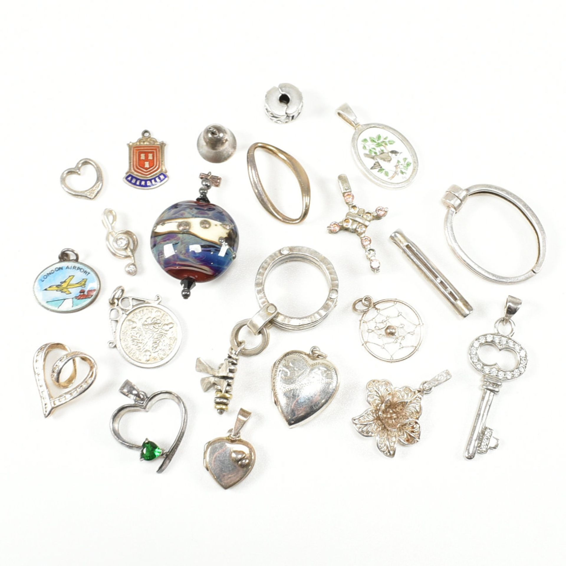 COLLECTION OF ASSORTED SILVER NECKLACE PENDANTS & CHARMS