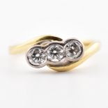 HALLMARKED 18CT GOLD THREE STONE CROSSOVER RING