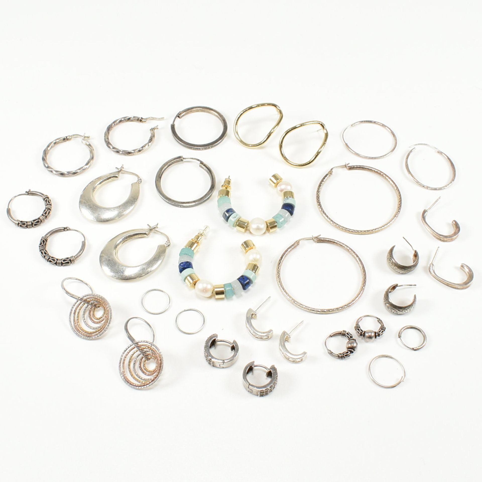 COLLECTION OF ASSORTED SILVER HOOP EARRINGS