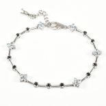 HALLMARKED 18CT WHITE GOLD GEM SET BRACELET