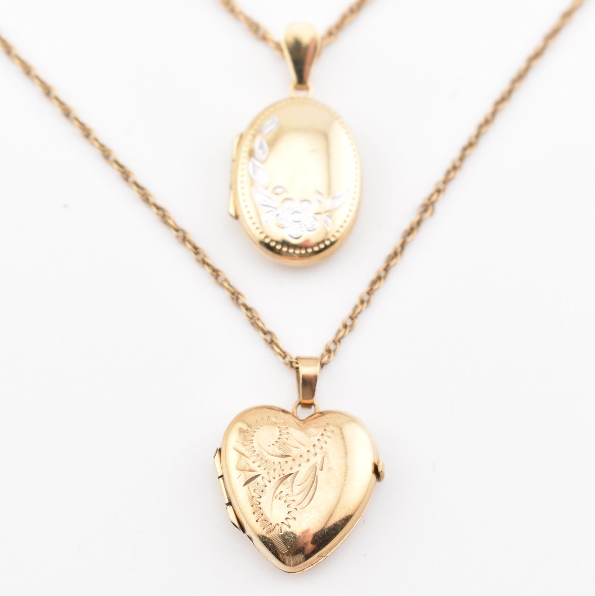TWO VINTAGE 9CT GOLD NECKLACE CHAINS WITH LOCKET PENDANTS