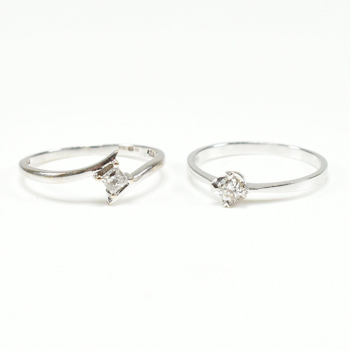 TWO 18CT WHITE GOLD & DIAMOND SOLITAIRE RINGS