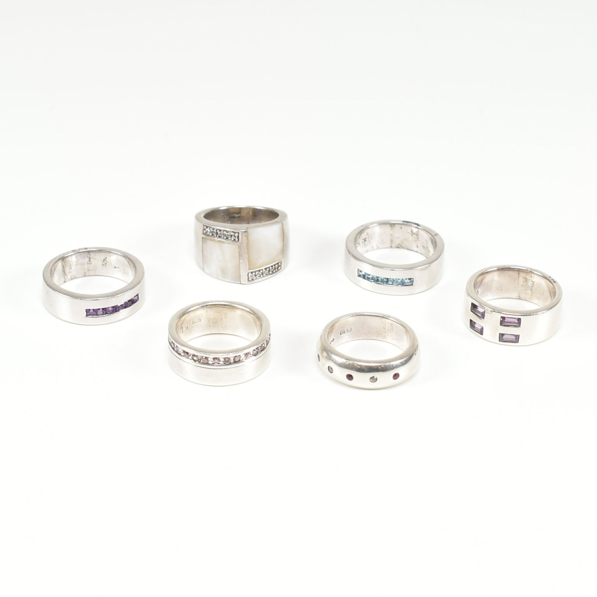 COLLECTION OF ASSORTED SILVER STONE SET RINGS