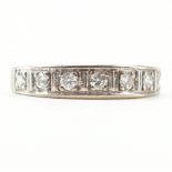 18CT WHITE GOLD & DIAMOND SEVEN STONE RING