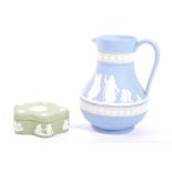 TWO PIECES OF WEDGWOOD JASPERWARE IN JUG AND POT FORM