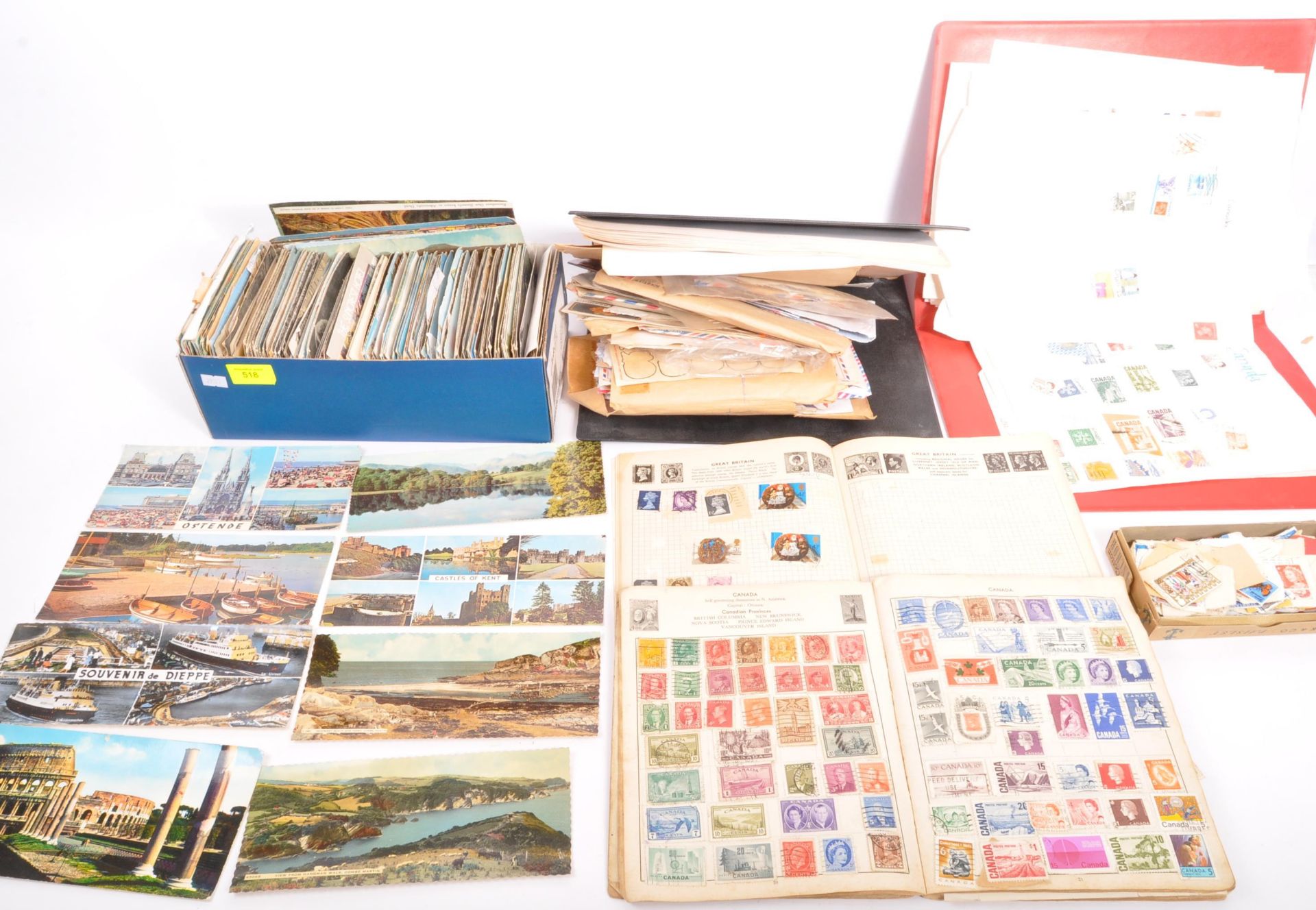 A LARGE COLLECTION OF STAMPS AND 1950'S POST CARDS