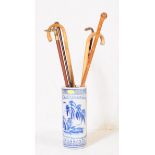 COLLECTION OF VINTAGE CARVED WALKING STICKS WITH STICK STAND