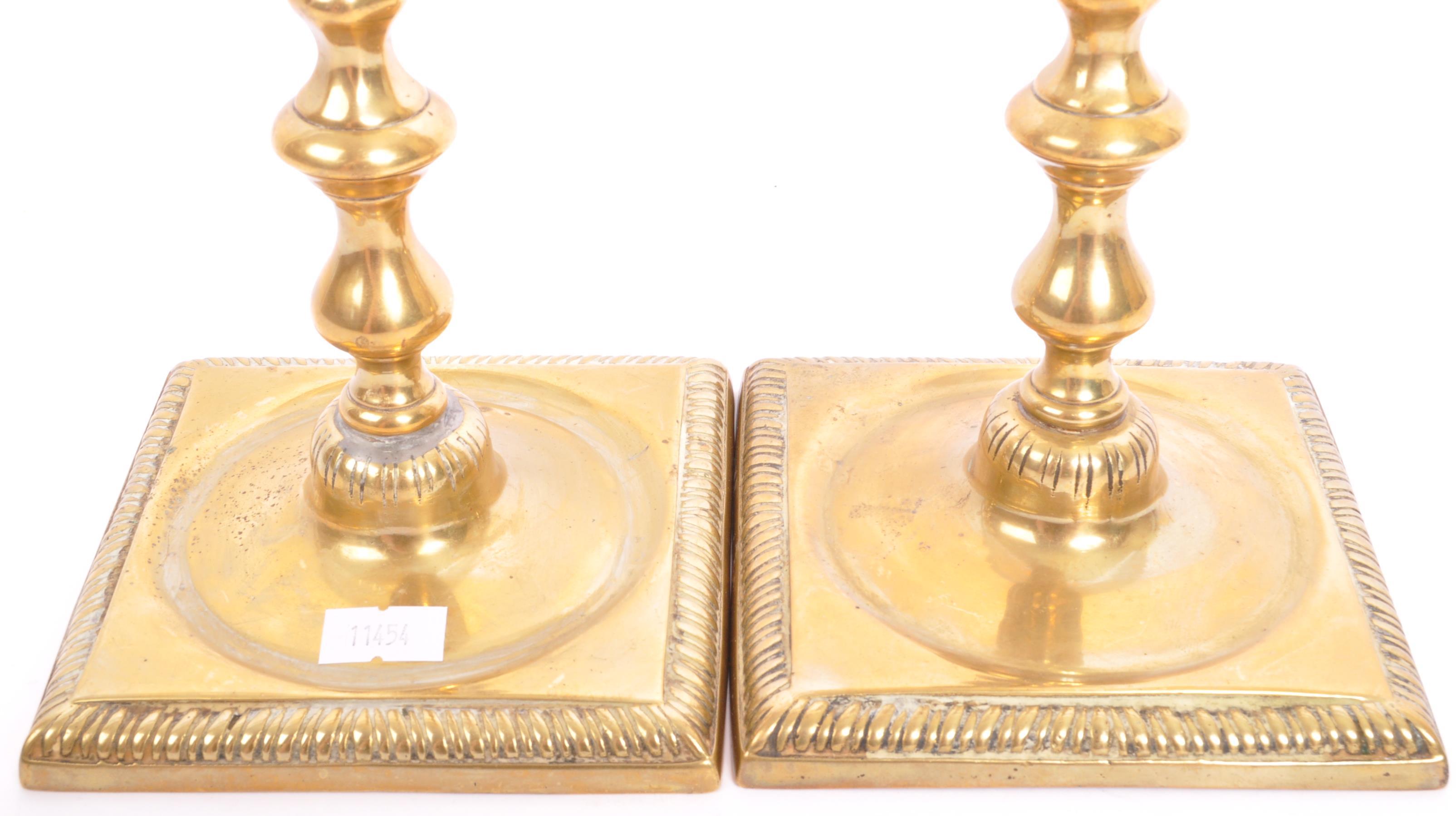 PAIR OF GEORGE III EARLY 19TH CENTURY BRASS CANDLE HOLDERS - Image 5 of 6