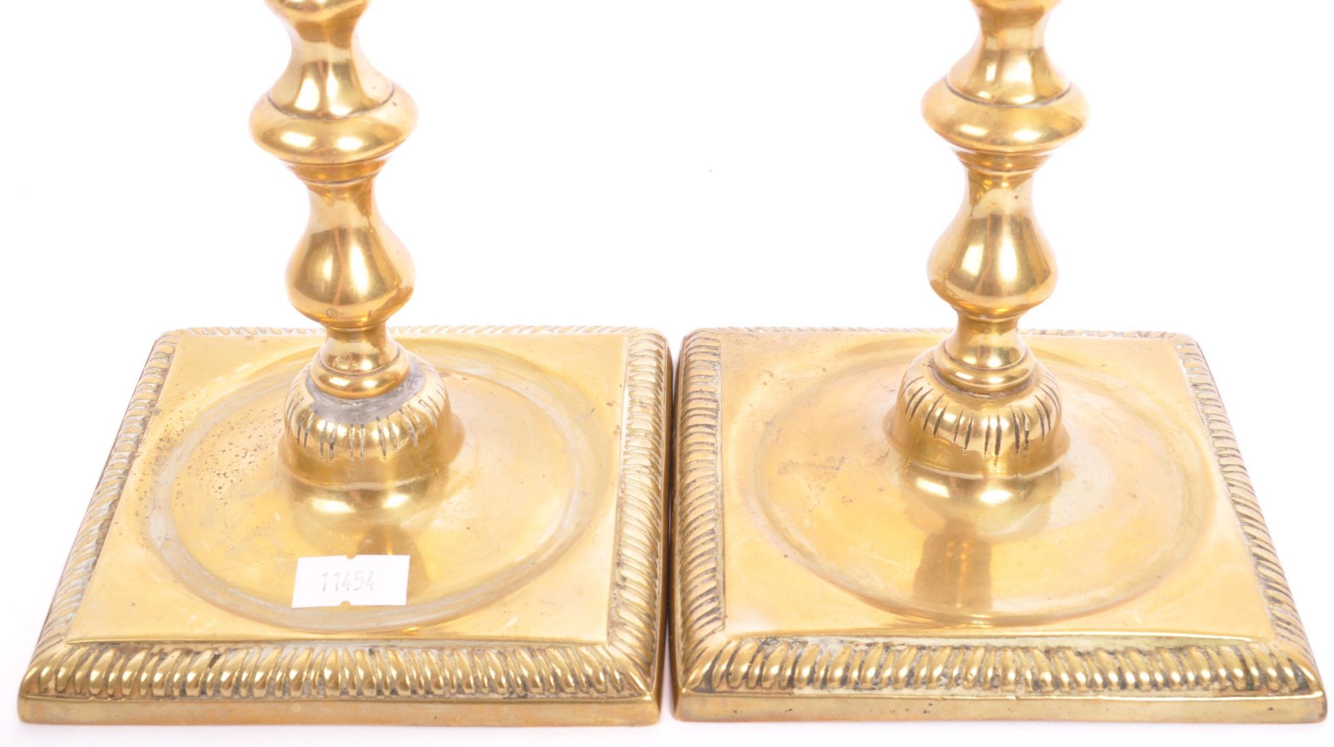 PAIR OF GEORGE III EARLY 19TH CENTURY BRASS CANDLE HOLDERS - Image 5 of 6