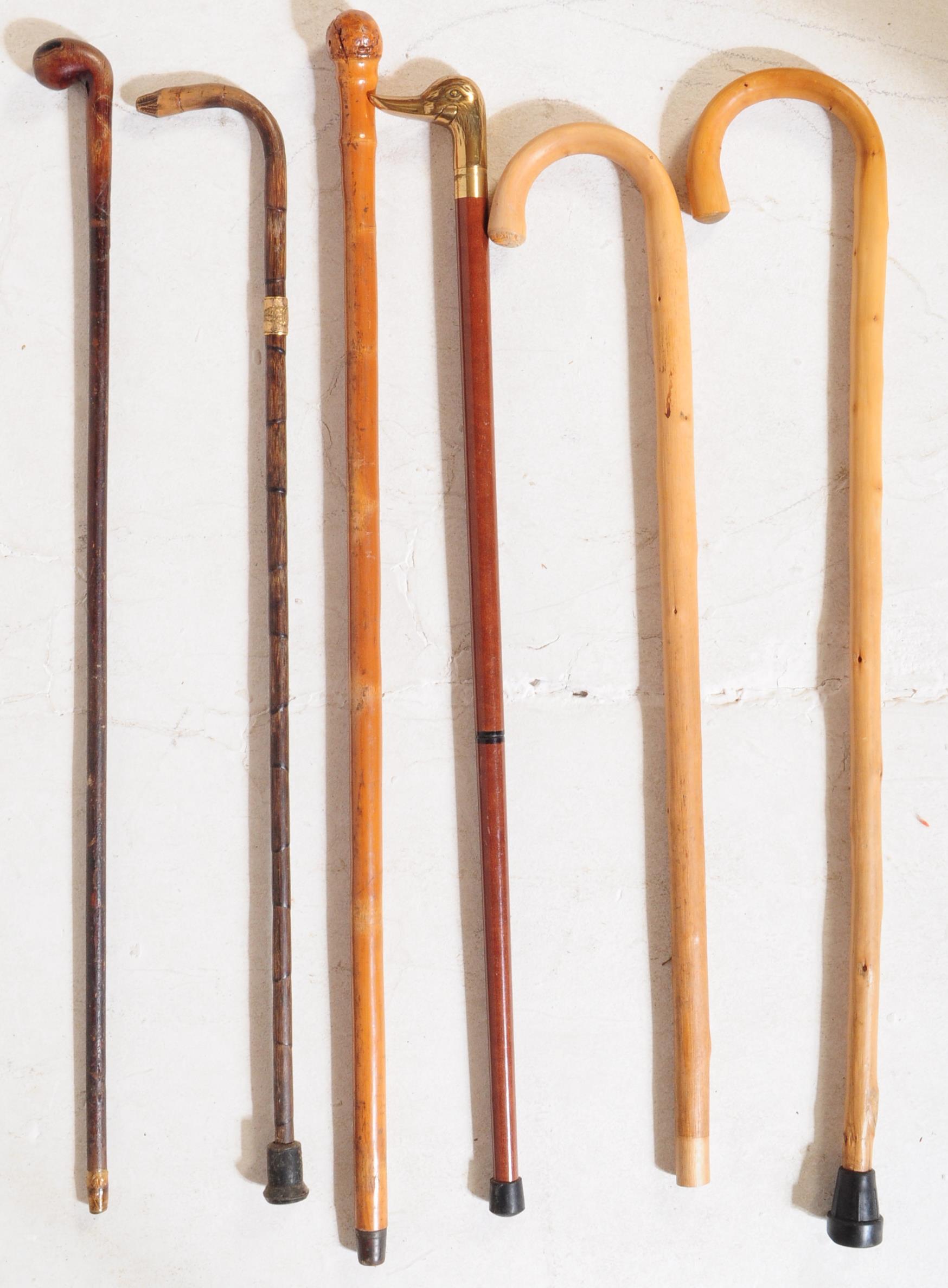 COLLECTION OF VINTAGE CARVED WALKING STICKS WITH STICK STAND - Image 3 of 4