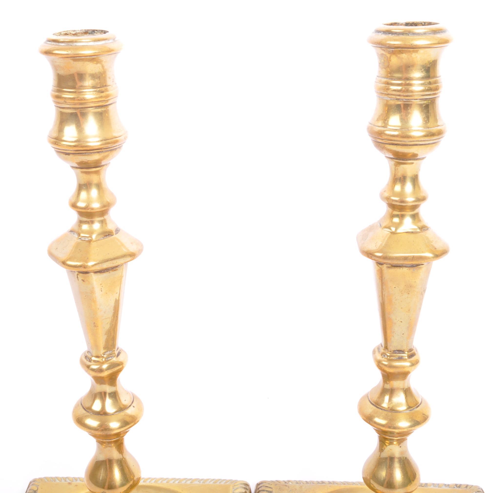 PAIR OF GEORGE III EARLY 19TH CENTURY BRASS CANDLE HOLDERS - Image 4 of 6