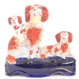 19TH CENTURY STAFFORDSHIRE POTTERY SPANIEL DOGS