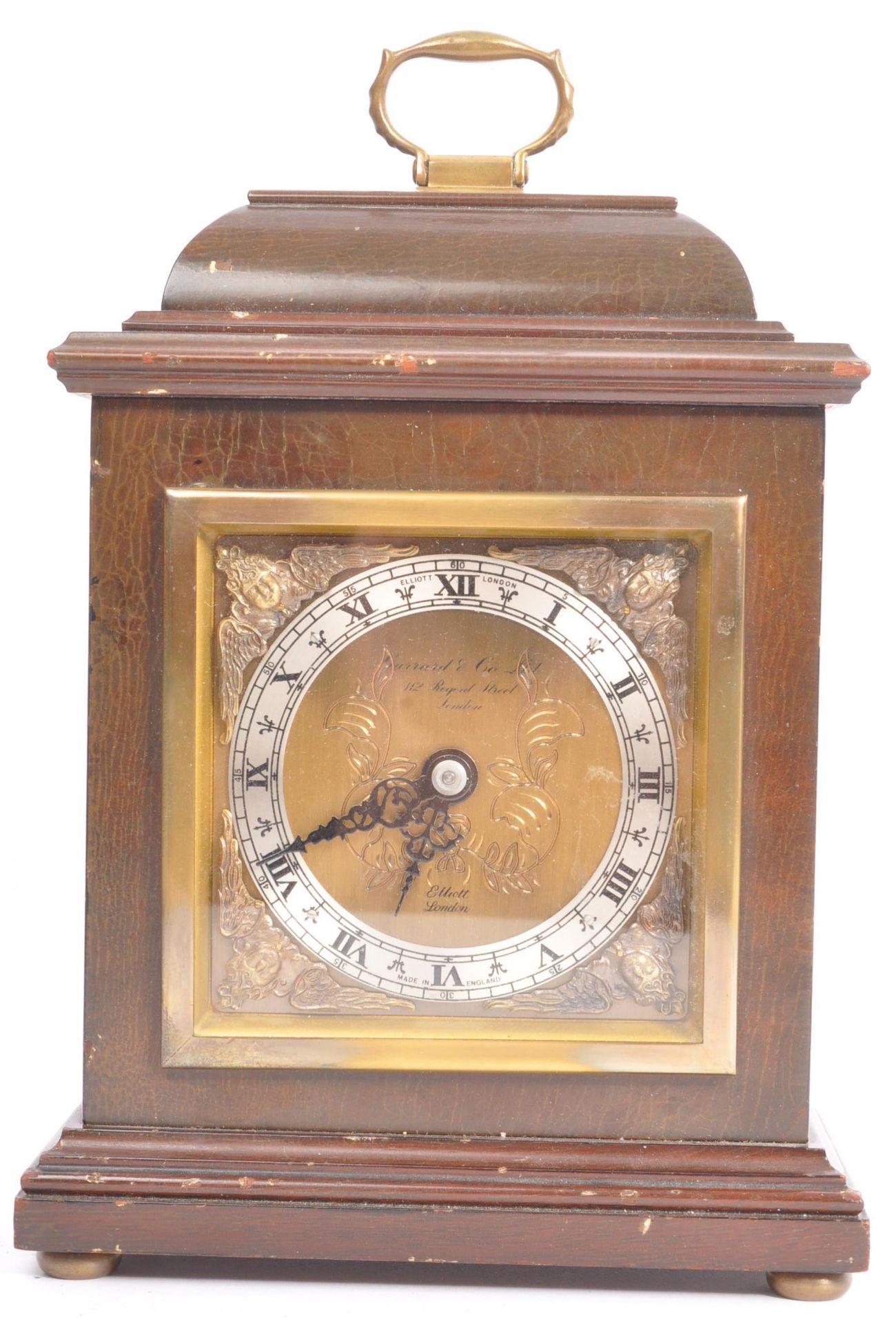 A VINTAGE 20TH CENTURY OAK CASED MANTLE CLOCK BY GARRARD & CO