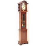 A MAHOGANY TEMPUS FUGIT LONGCASE GRANDMOTHER CLOCK