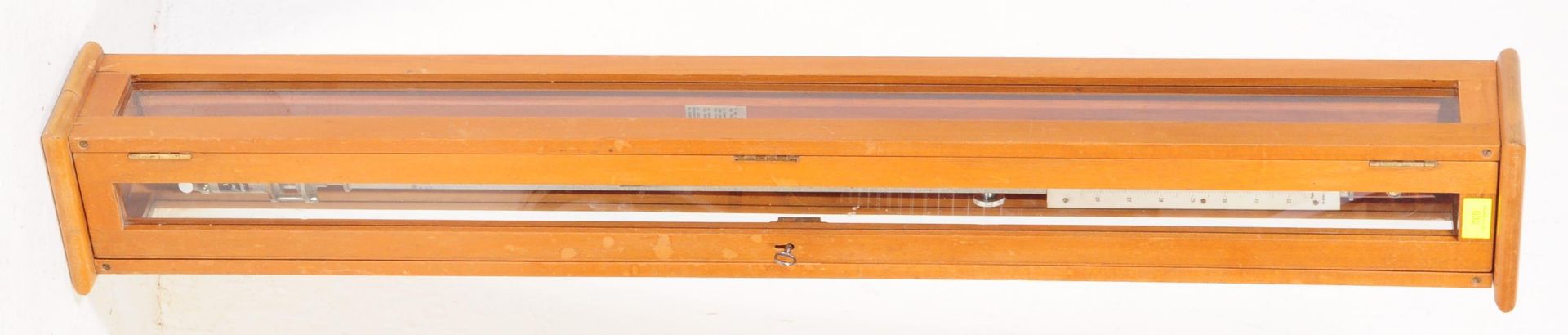 A MID CENTURY SHIPS MARINE STICK BAROMETER TEAK CASED