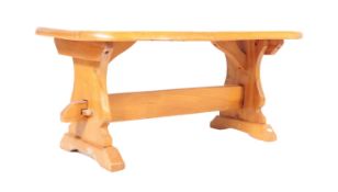 A MID TO LATE 20TH CENTURY DEVON ELM COFFEE TABLE