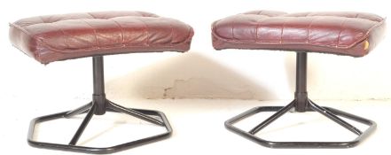 TWO 20TH CENTURY BURGUNDY LEATHER UPHOLSTERED FOOTSTOOLS