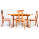 A RETRO VINTAGE TEAK G-PLAN DINING TABLE AND FOUR CHAIRS