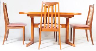 A RETRO VINTAGE TEAK G-PLAN DINING TABLE AND FOUR CHAIRS