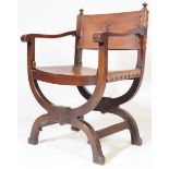 AN EARLY 20TH CENTURY SAVONAROLA ARMCHAIR