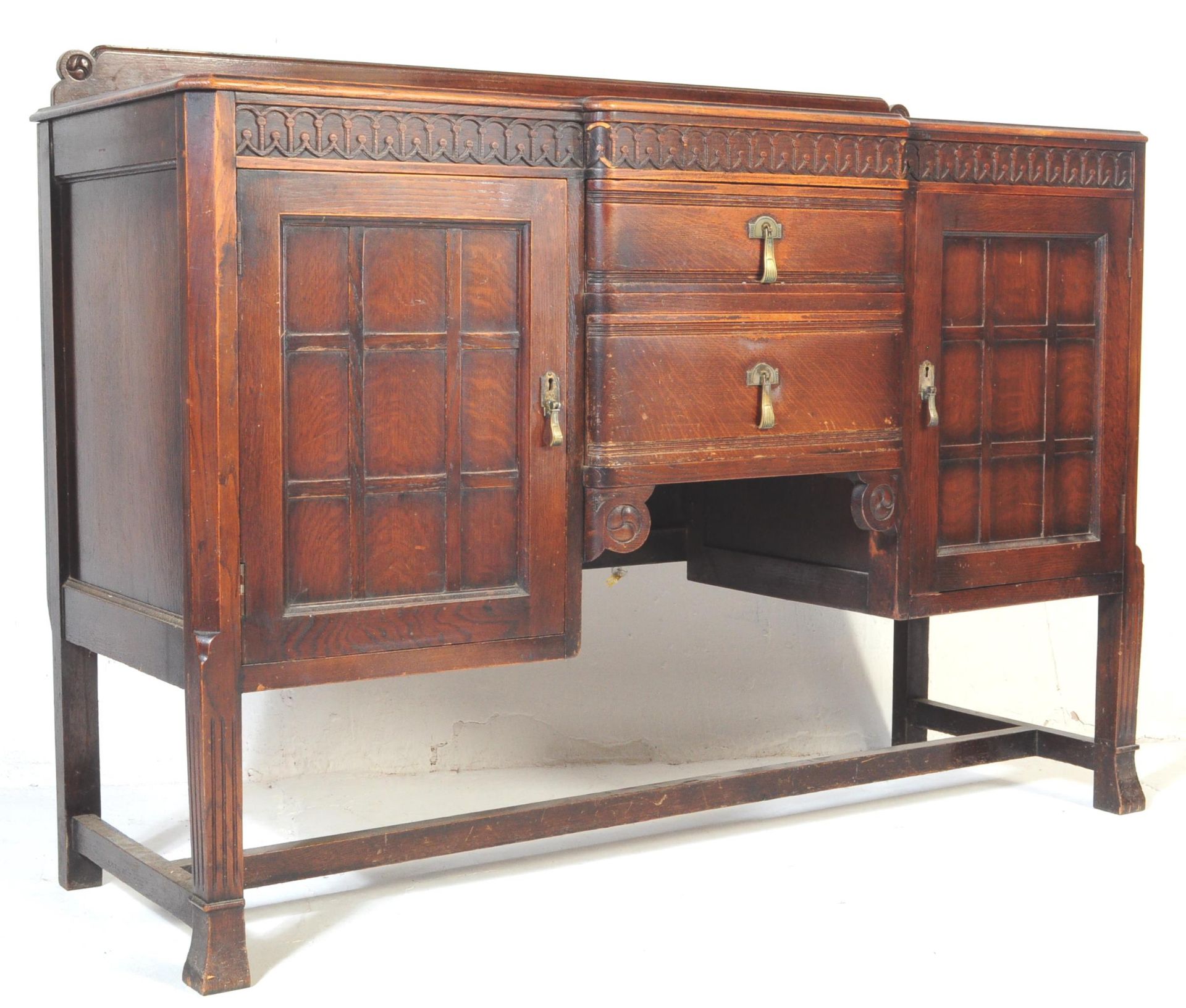 EARLY 20TH CENTURY JACOBEAN REVIVAL OAK SIDEBOARD