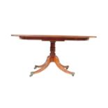 A GEORGE III MAHOGANY PEDESTAL DINING TABLE