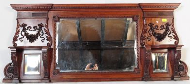 A VICTORIAN CARVED MAHOGANY OVER MANTEL MIRROR