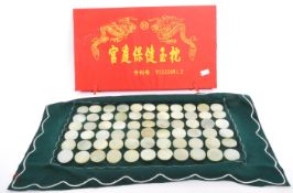 COLLECTION OF CHINESE HOMEOPATHIC NEPHRITE JADE DISCS