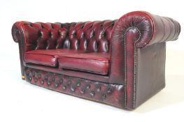 EARLY 20TH CENTURY OX BLOOD LEATHER CHESTERFIELD SOFA