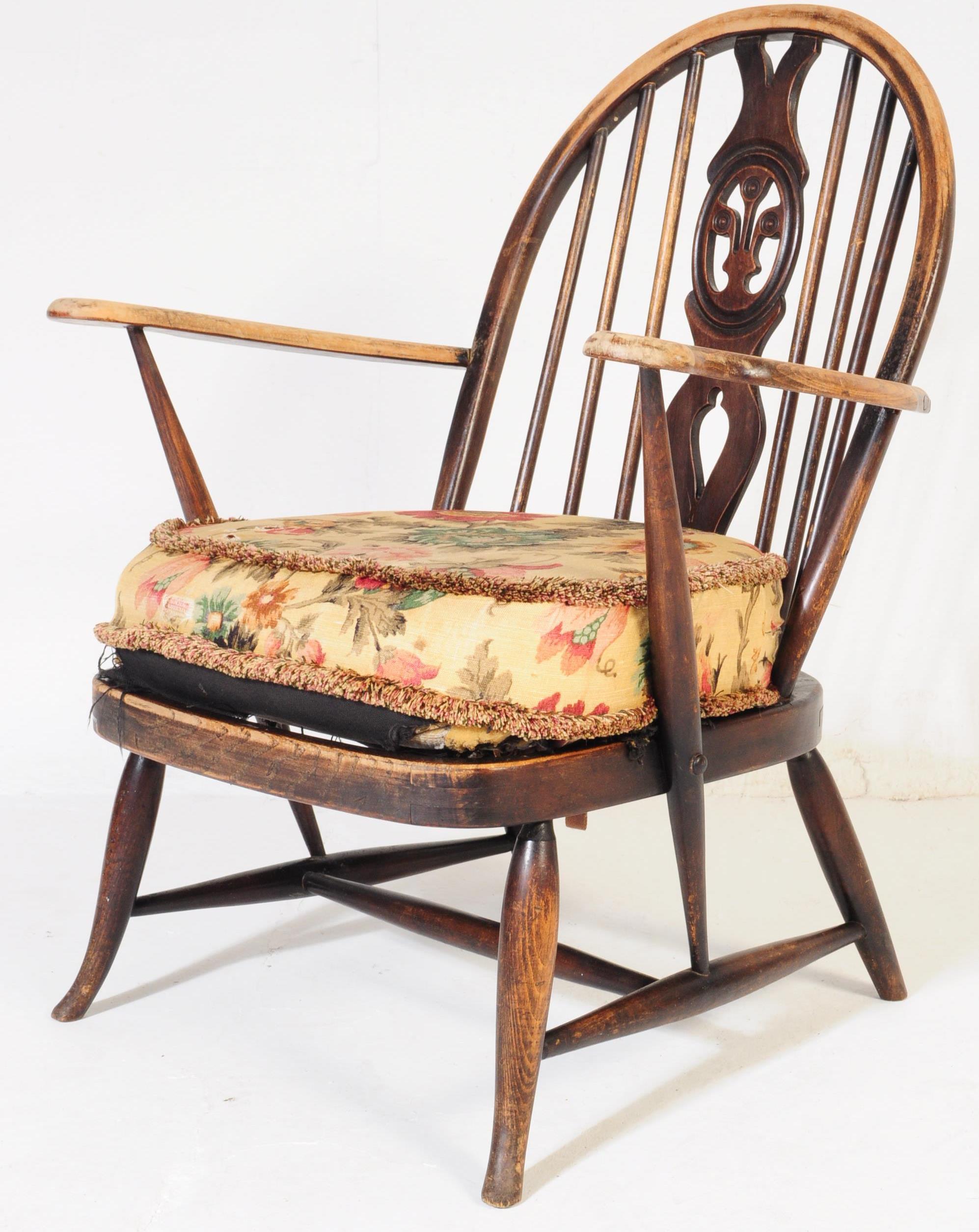 MID 20TH CENTURY ERCOL FLEUR DE LYS LOUNGE ARM CHAIR