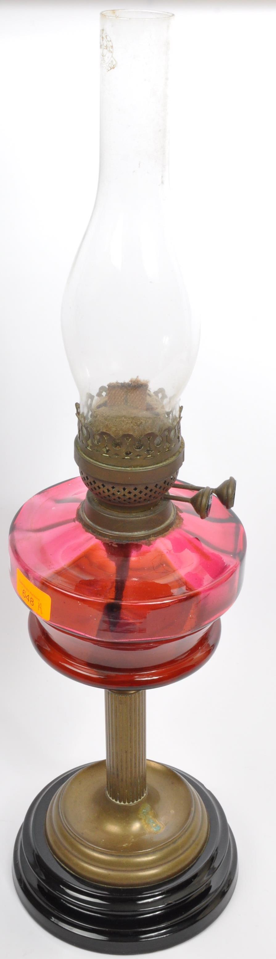 19TH CENTURY CRANBERRY GLASS AND BRASS OIL LAMP