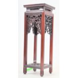 TWENTIETH CENTURY CHINESE HARDWOOD VASE STAND