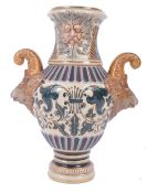 TWIN HANDLED VICTORIAN MAJOLICA VASE WITH CLASSICAL DESIGN