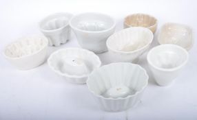 ELEVEN VINTAGE EARLY 20TH CENTURY JELLY MOULDS